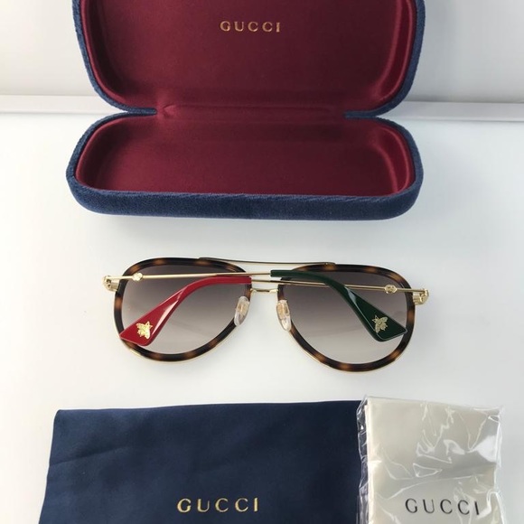 GUCCI Brown Gradient Sunglasses
GG0062S 012 57 - Picture 11 of 15